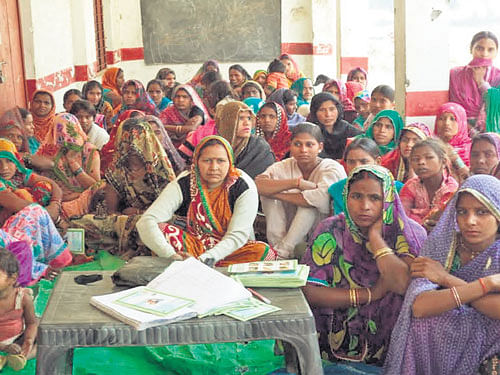 Women attend a health camp.