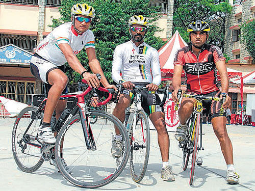happy faces: (From left) Sreedhar Savanur, winner of the Champion Race (60km) in the Cycling Marathon on Sunday, poses with C&#8200;Rajesh&#8200;(second) and Atul Kumar (third).
