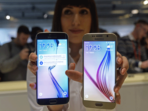 Korean electronics giant Samsung today unveiled its much-awaited Galaxy S6 and Galaxy S6 Edge smartphones and would begin selling them in India and other markets from April 10 to compete with rival iPhone 6. AP photo