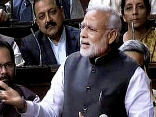 Prime Minister Narendra Modi speaks in the Rajya Sabha in New Delhi on Tuesday. PTI Photo / TV GRAB