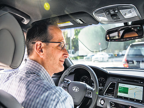 NEXT-GENNAVIGATION: AndrewBrenner, of Google's Android Auto Programme, said it tried to minimise distraction during tasks people frequently dowhile driving, while also deciding what should be prevented in the car altogether. NYT