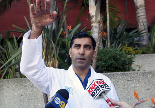 Dr. Sanjay Khurana talks to reporters, at his office in Marina Del Rey, Calif., on Friday, March 6, 2015, about how he saw actor Harrison Ford's plane falling from the sky while on a golf course on Thursday. Khurana was one of the first people to come to Ford's aid after the crash. AP photo