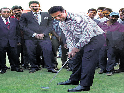 solid as ever: Rahul Dravid makes a putt after the inauguration of the 18-hole course at the Chikkamagaluru Golf Club on Saturday. DH photo