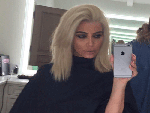Reality TV star Kim Kardashian has revealed that pop queen Madonna inspired her latest blonde look. Image courtesy: Twitter