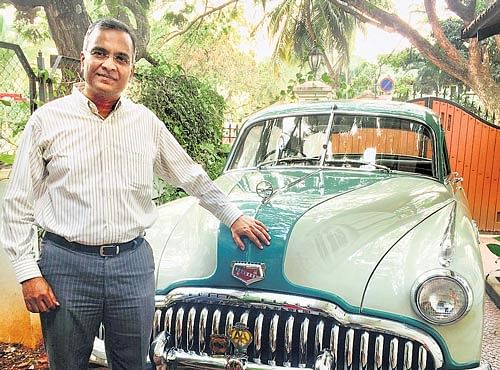 ALL SMILES Balachandra A Yadalam with his 'Buick Super8'.