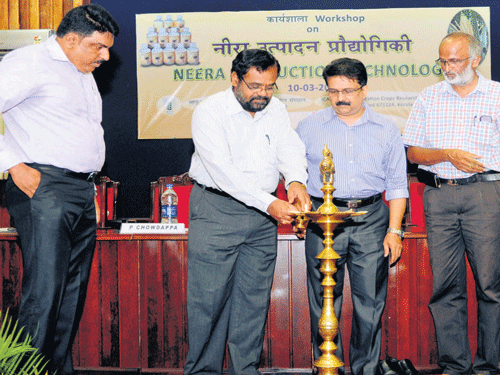 'Kalparasa', Neera in the form of natural health drink launched by the CPCRI. (Right) CPCRI Director Dr P Chowdappa  inaugurates a workshop on Neera Production Technology at Kasargod on Tuesday. DH Photos