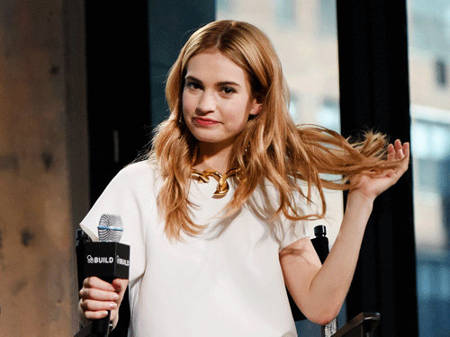 After much being said about Lily James' tiny waist in upcoming Walt Disney Pictures' 'Cinderella', the actress said she is tired of talking about her body. AP File Photo