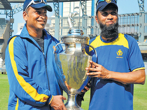 J Arun Kumar on Thursday achieved the rare feat of winning the Ranji Trophy title twice in succession as player and as coach.  DH photo