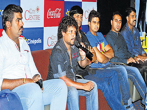 Soombe film Director Saikrishna Kudla addresses mediapersons at a press conference held at Cinepolis in Mangaluru on Wednesday. Producer Kishor Kottari, actors Rahul, Bhojraj Vamanjoor look on among others. DH Photo