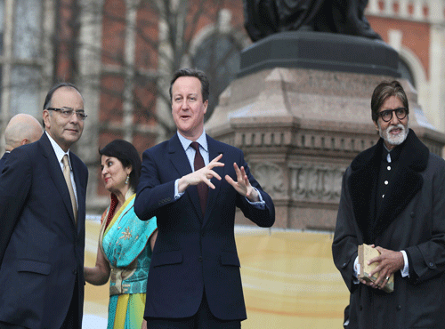Indian finance minister Shri Arun Jaitley, Britain's Prime Minister David Cameron and Indian actor Amitabh Bachchan attend the unveiling of a statue of Mahatma Ghandi in parliament square London. Reuters photo