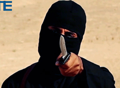 A freed Islamic State hostage has given a chilling account of how cold-blooded IS executioner 'Jihadi John' ran a sword across his throat during a mock execution in Syria. Reuters file photo
