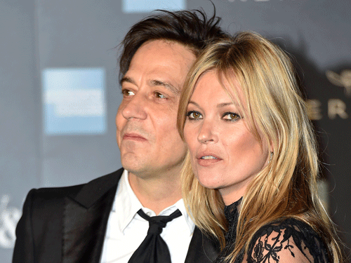 Supermodel Kate Moss' husband Jamie Hince is planning an exhibition of his wife's naked photographs. Reuters File photo