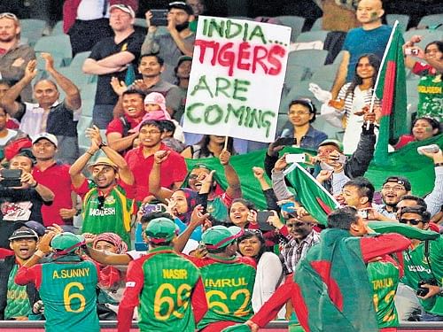 WILL THEYROAR? Bangladesh fans believe their country can beat defending champions India in their quarterfinal clash at theMCGon Thursday. REUTERS photo