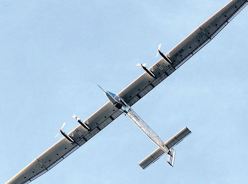 BACK TO FUTURE: 'Solar Impulse 2', the solar powered plane, is seen on flight after taking off fromthe airport inAhmedabad onWednesday. The plane willmake a stop at Varanasi before heading toMyanmar. REUTERS