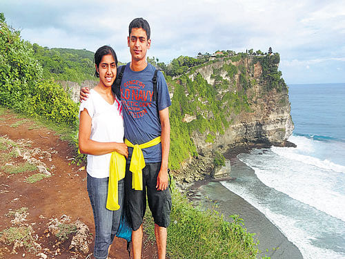 ADVENTUROUS The author and her husband Prasanna Kumar at Uluwatu and (top) a view of Tanah Lot.