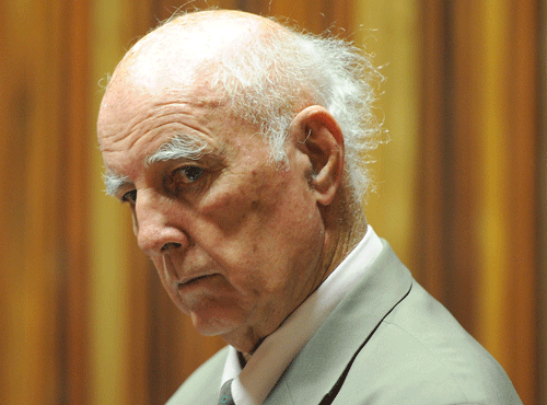 Retired tennis player Bob Hewitt sits in the dock in a court east of Johannesburg, South Afirca, Monday, March 23, 2015. Hewitt, a former Grand Slam doubles tennis champion, was convicted in a South African court of rape and sexual assault decades after the alleged assaults. (AP Photo)