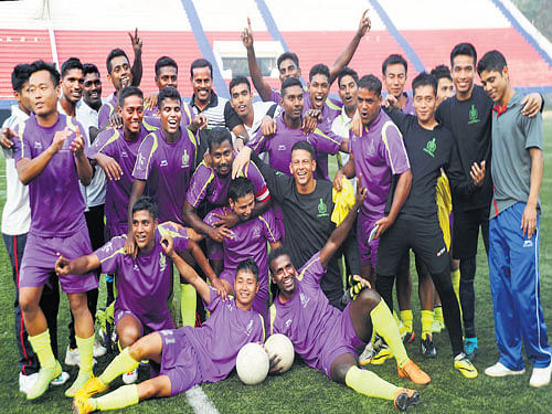 HAPPY BUNCH: Army Service Corps (ASC) players celebrate after winning the&#8200;BDFA  Super Division title in Bengaluru on Tuesday.  DH PHOTO