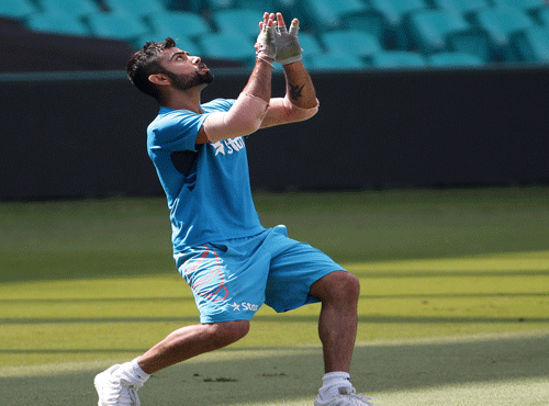 ndia's Virat Kohli goes to catch a ball during fielding practice for the Cricket World Cup in Sydney, Australia, Wednesday, March 25. AP file photo