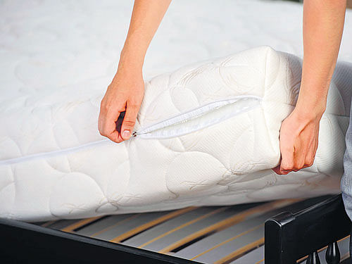 Use a vinyl or cotton cover to protect your mattress.