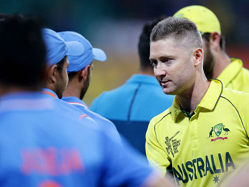 Australia's Michael Clarke shakes hands with the Indian players after their 95 run win in their Cricket World Cup semifinal in Sydney, Australia, Thursday, March 26, 2015. AP Photo