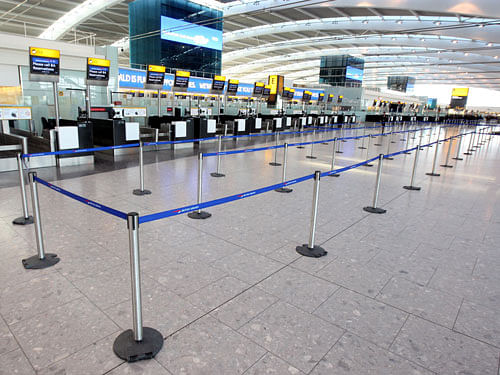 A general view of a quiet Terminal 5 at London's Heathrow Airport. AP Photo.