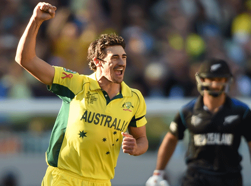 Australia's Mitchell Starc celebrates after taking the wicket of New Zealand wicketkeeper Luke Ronchi during the Cricket World Cup final in Melbourne, Australia, Sunday, March 29, 2015. AP file photo