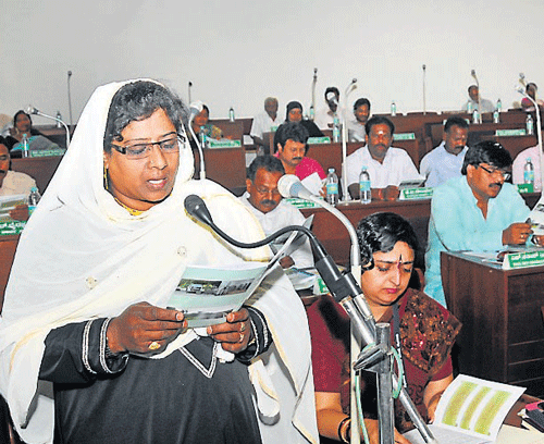 Haseena Taj, chairperson of the Standing Committee on Taxation, Finance and Appeals, presented the budget, in Mysuru, on Monday. DH PHOTO