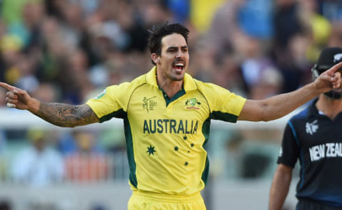 Mitchell Johnson celebrates the dismissal of New Zealand's Daniel Vettori during the ICC Cricket World Cup final in Melbourne.AP photo