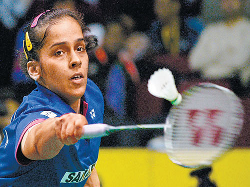 GUTSY: India's Saina Nehwal returns one to China's Sun Yu in their quarterfinal clash in the Malyasia Open Super Series badminton tournament on Friday.  Saina won the match 21-11, 18-21, 21-17.  AFP