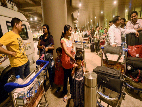 Indian nationals evacuated from Yemen, upon their arrival at the International Airport in Mumbai on early Saturday morning. PTI Photo