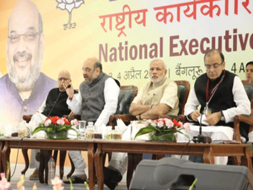 Senior Leader LK Advani, President Amit Shah, Prime Minister Narendra Modi and Union Minister Arun Jaitely at the BJP national executive meeting in Bengaluru on Saturday. DH Photo