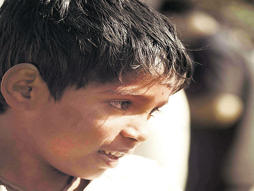 Child actor Mayur as Budhia Singh in Duronto.
