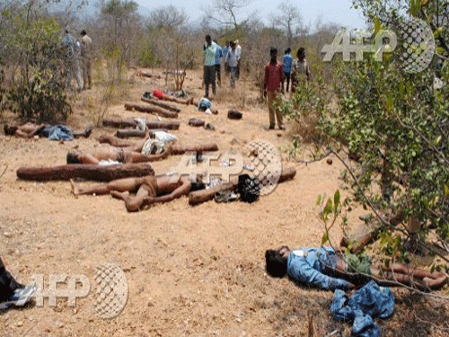 The bodies of suspected sandalwood smugglers, who were killed in an encounter with a joint team of special police and forest personnel, lie in the Seshachalam forest of Chittoor district. AFP photo