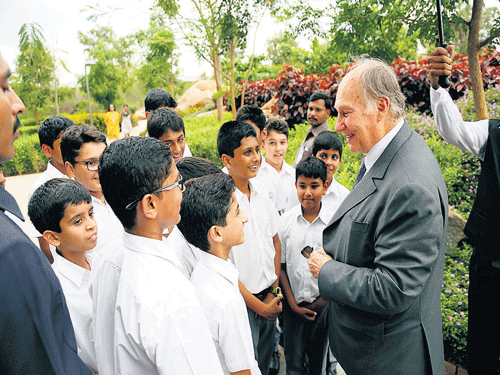 one among them Aga Khan interacts with students on his campus tour. DH Photo