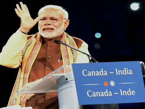 Prime Minister, Narendra Modi addressing the gathering at the Indian Diaspora Event, at Ricoh Coliseum, in Toronto, Canada. PTI photo