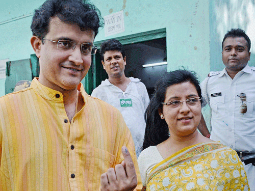 Former cricket captain Sourav Ganguly with his wife Dona Ganguly (R) after casting their votes during Municipal Corporation elections in Kolkata on Saturday. PTI Photo