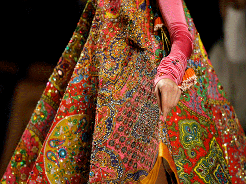A model wears a creation. AP File Photo for representation.