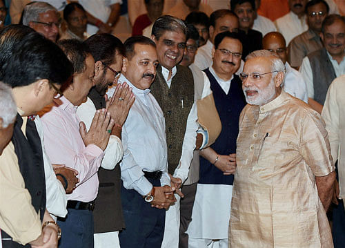 Prime Minister Narendra Modi greeta MP's during 'Garib Kalyan Yojana', a workshop about the various pro poor policies initiated by the Government for party MPs in New Delhi on Sunday . PTI Photo
