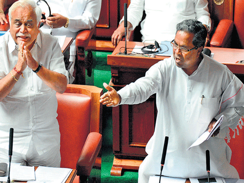 HIGHDRAMAMinister R V Deshpande requests the Opposition to allowChief Minister Siddaramaiah to speak during the special Legislative Assembly session in Bengaluru on Monday. DH PHOTO
