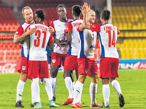 Eugeneson Lyndoh (right) celebrates with his Bengaluru FC team-mates after scoring the opening goal against Bharat FC on Friday. BFC media