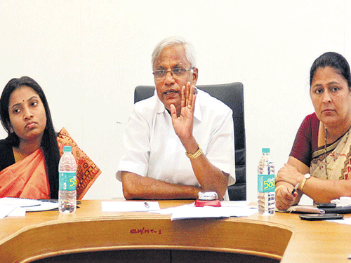 MLA J R Lobo chairs a review meeting at Mangalore City Corporation in Mangaluru on Saturday. Mangalore City Corporation Commissioner Hephsiba Rani Korlapati (left) and Mayor Jacintha Vijaya Alfred look on. DH photo