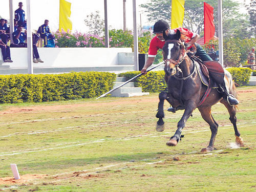 ON TARGET Balram Yadav of ASC (North), en route his win in the Tent Pegging Lance (Individual) on Saturday.