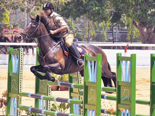 top stuff BSF's Sumer Singh in action en route his win in the Open Show Jumping (Senior) in Bengaluru on Sunday. dh photo