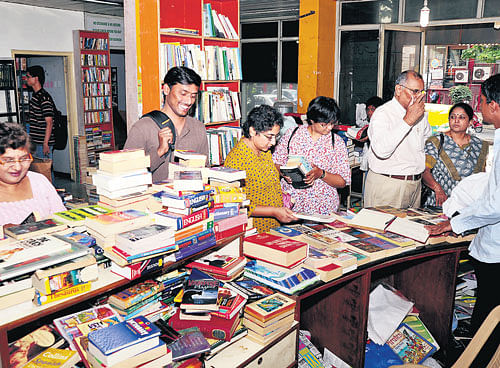 Engrossed: Customers browsing the books at the store.