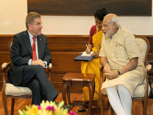 Prime Minister Narendra Modi with President of the International Olympic Committee Thomas Bach during a meeting, in New Delhi. PTI