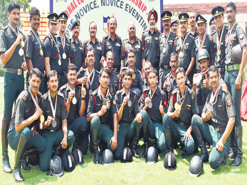 champions: Winners at the National Equestrian Championships in Bengaluru on Friday. dh photo