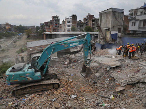 Debris is cleared after damage caused by the massive earthquake in Kathmandu. AP