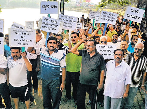 Walk the talk: Members of Save Sankey Forum stage a protest against the proposed  construction of an apartment on the tank premises, on Sunday. DH&#8200;PHOTO