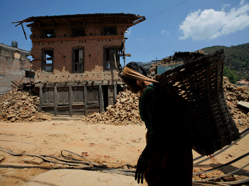 As India carried out relief operations in quake-hit Nepal, a section of the Indian media drew ire on social media for "injecting sensationalism" in its coverage of the tragedy that struck the Himalayan nation. AP image