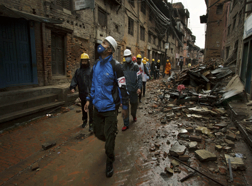Nepal has asked India and 33 other countries to wrap up search and rescue operations ten days after a devastating earthquake killed more than 7,300 people. Reuters image